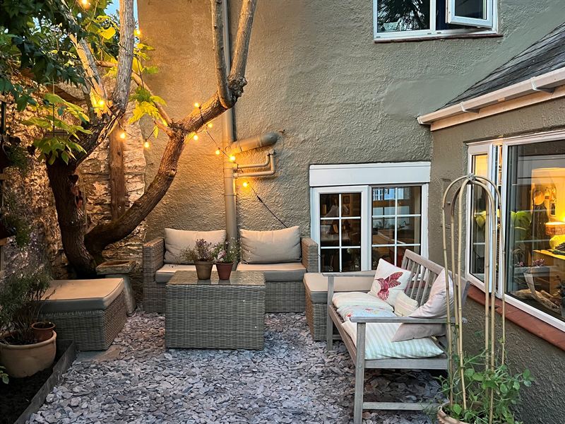 Courtyard garden with freshly painted render